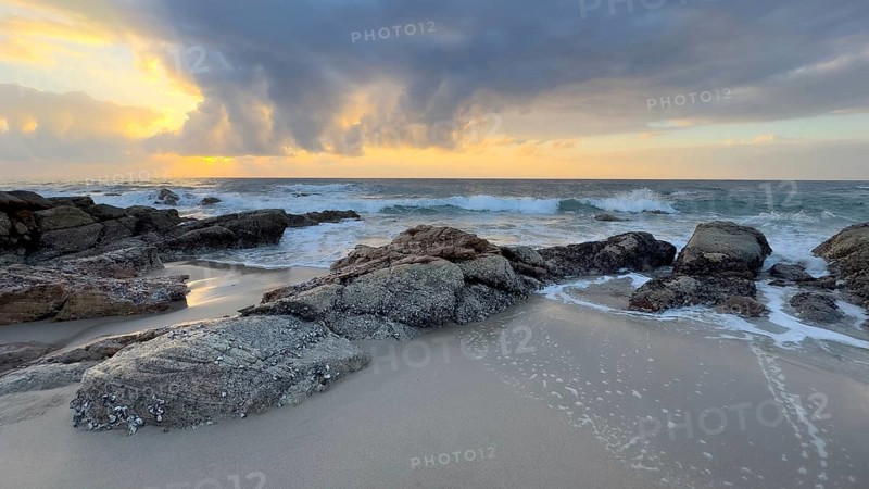 Sunrise on the beach, coast near Sadah, Oman