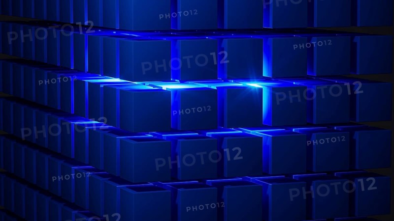 Cube structures create a captivating geometric arrangement highlighted by blue light, showcasing modern design concepts and technological inspiration