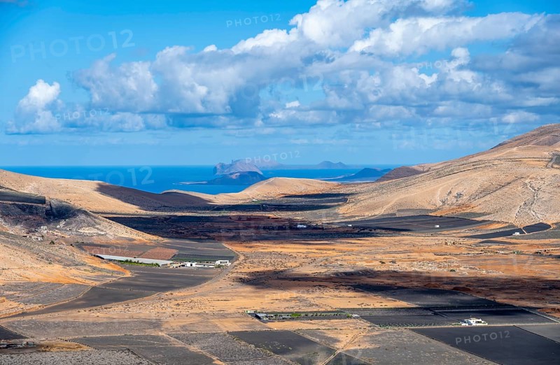 Dry volcanic landscape with fields, Lanzarote, Canary Islands, Spain