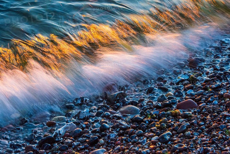 Wave play at sunrise on the chalk coast in Jasmund National Park, Rügen, Sassnitz, Mecklenburg-Western Pomerania, Germany