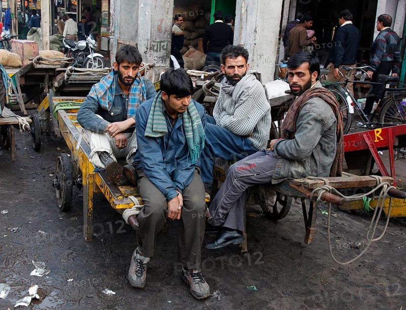 New Delhi, India, 14.01.10 - Market scene, day labourers waiting to work at the market in New Delhi, India