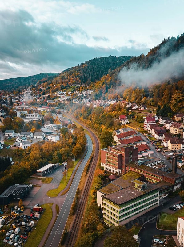Aerial view of a road into town in the morning in autumn, Bad Wildbad, Black Forest, Germany