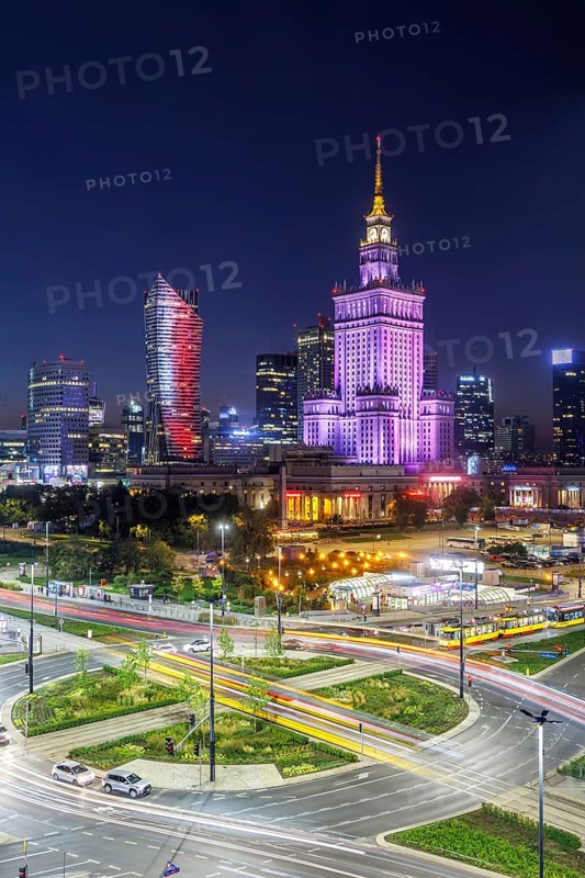 Warsaw skyline skyscrapers with Palace of Culture in the city centre at night in Warsaw, Poland