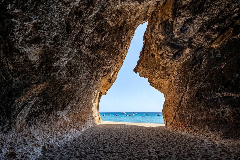 Rock cave on the beach at Cala Luna, Golfo di Orosei, Baunei, Sardinia, Italy