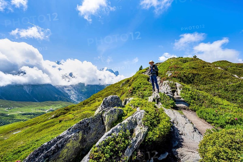 Mountaineers on a hiking trail with mountain views, hiking to the Aiguillette des Posettes, Chamonix, Haute-Savoie, France