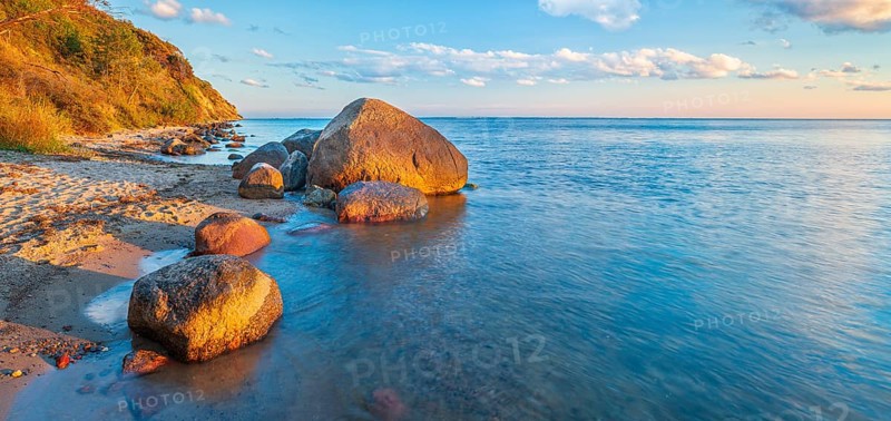 Coastal landscape with large boulders on the Baltic Sea beach in the evening light, Mönchgut Nature Reserve, Groß Zicker, Mönchgut Peninsula, Rügen Island, Mecklenburg-Western Pomerania, Germany