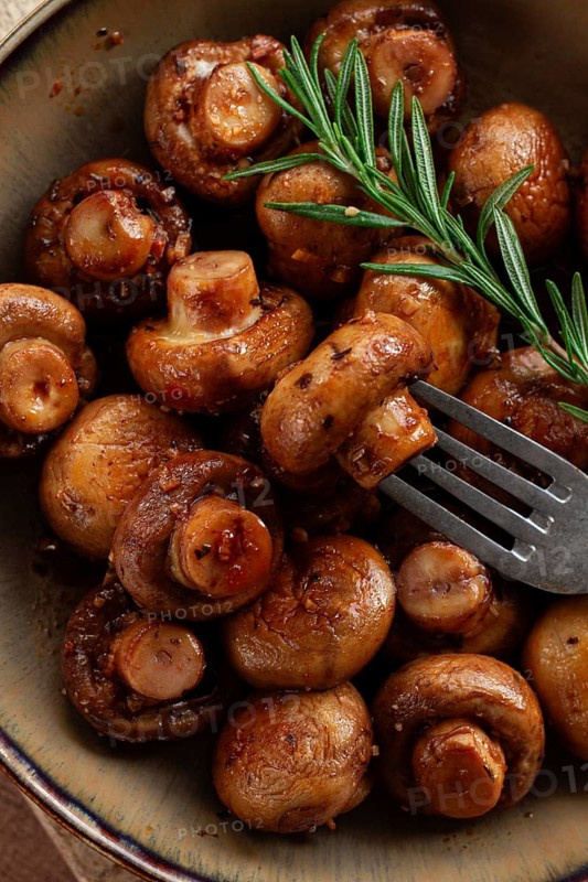 Fried mushrooms, with spices, in soy sauce, vegetarian food, homemade, no people