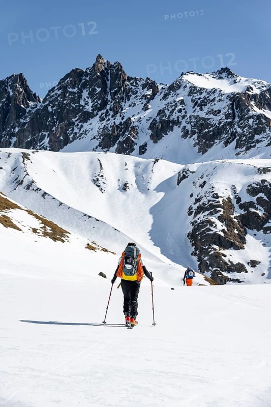 Ski tourers on the Graubünden Haute Route, Snow-covered mountains, Winter in the Albula Alps, Graubünden, Switzerland