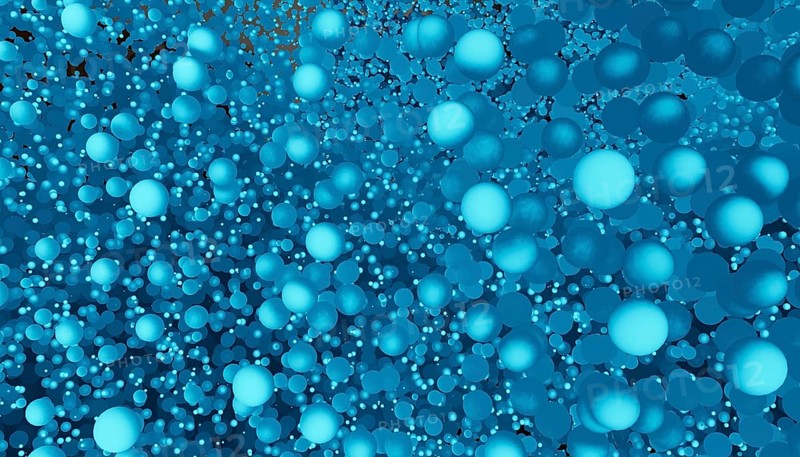 An abstract image showcasing numerous blue spheres of various sizes in a 3D space, creating a visually compelling texture with a cool tone color palette