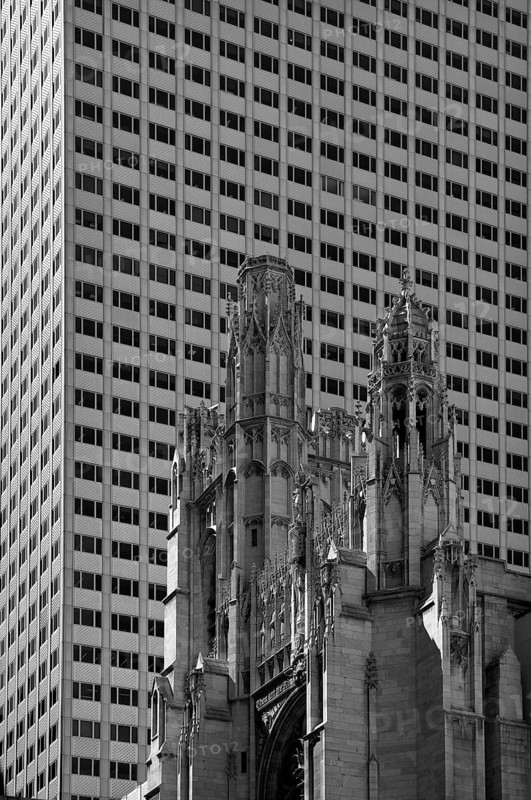 St Patrick's Cathedral in front of a skyscraper facade, New York City, USA