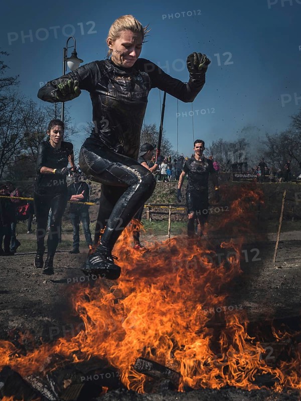 WROCLAW, POLAND - APRIL 7, 2018: Extreme running with obstacle RUNMAGEDDON. In the picture a runner on the Recruit route