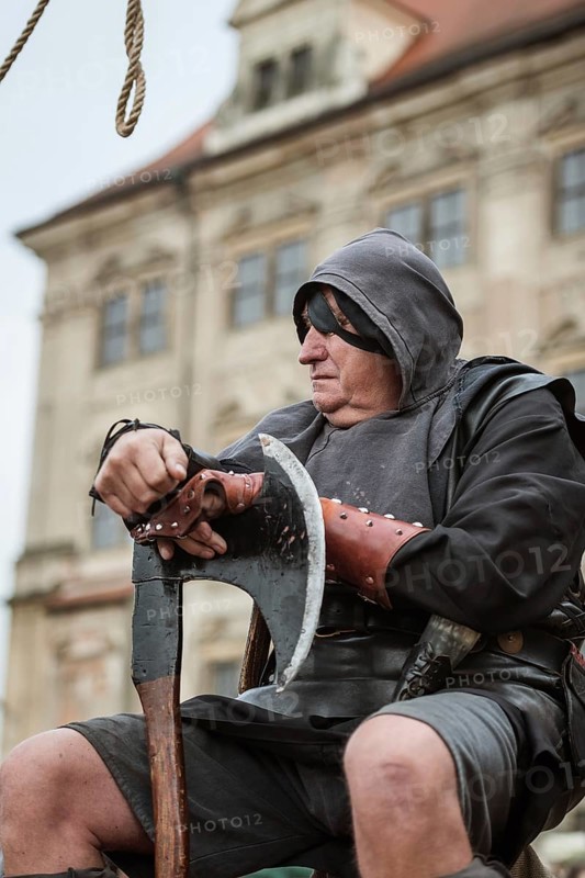LUBIAZ, POLAND - AUGUST 25, 2018: Monastery Siege - Medieval executioner with the big ax