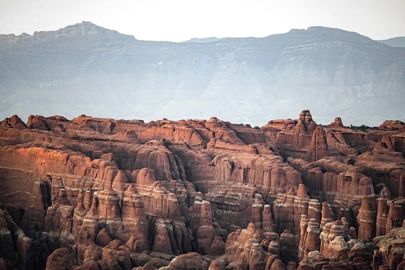 Breathtaking view of the stunning red rock formations at Arches National Park, showcasing the unique geological features and natural beauty under a clear sky