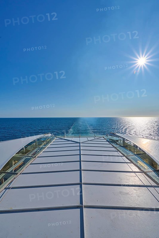 View from the ship's deck, Mein Schiff 6, of the vast sea under bright sunshine and blue skies, North Sea, Norway