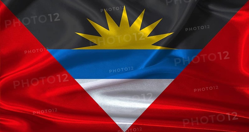 National flag of Antigua and Barbuda with cloth texture. Antigua and Barbuda flag with realistic texture background