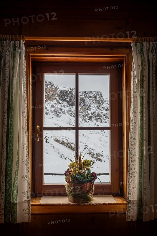 View from the window of a mountain hut, Schlüterhütte, Gampenwiese, Dolomites, snow, Puez-Geisler nature park Park, St. Magdalena, Villnöß, Funes, Villnößtal, South Tyrol, Italy