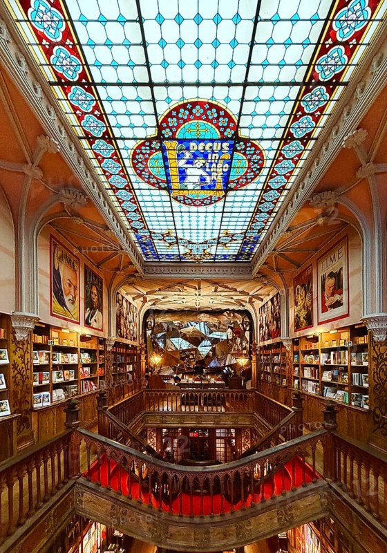 Livraria Lello, interior of the Lello bookstore on the upper floor with the magnificent ceiling glass window by Samuel Van Krieken, Porto, Portugal