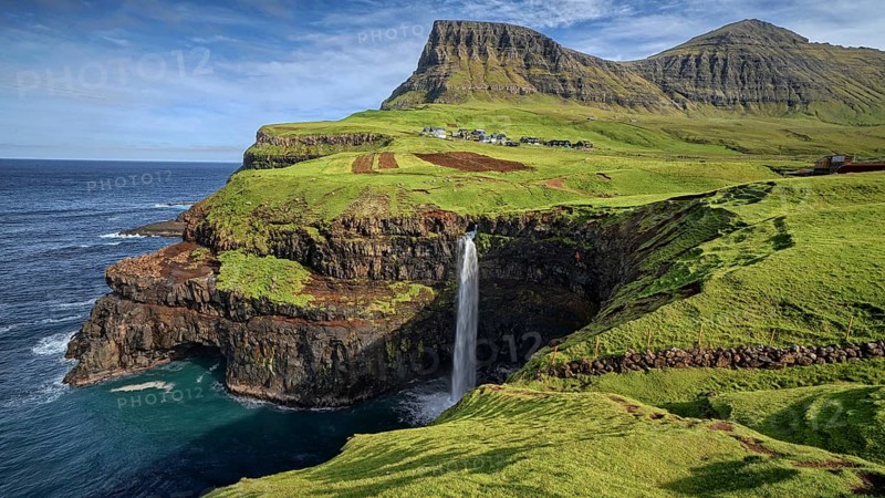 The waterfall with view of Mulafossur, Faroe Islands, Denmark, Faroe Islands, Denmark