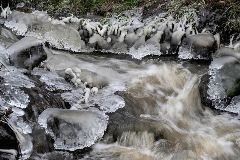 Natural ice sculptures on a stream, Emsland, Lower Saxony, Germany