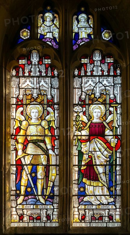 Stained glass window of Saint Michael and Saint Gabriel, church of Saint Peter, Manningford Bruce, Wiltshire, England, UK by Clayton and Bell c 1900