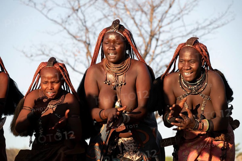Himba woman dancing euphorically, traditional dance, traditional Himba village, Kaokoveld, Kunene, Namibia