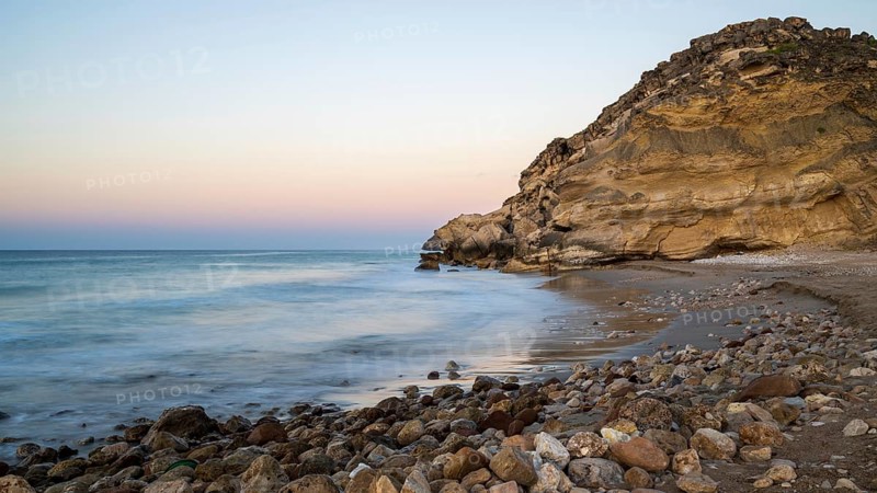 Sunrise on the coast near Mirbat, Oman
