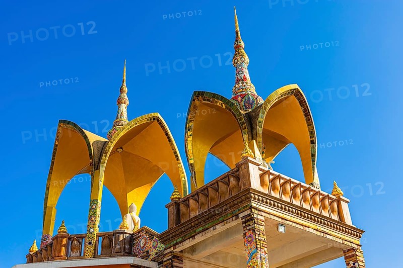 Round arch pavilions decorated with colorful mosaics and glass works of art, Buddhist temple complex Wat Phra That Sorn Kaew, Phetchabun province, Thailand