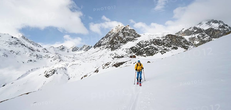 Ski tourers in a wintry mountain landscape, ascent to Piz Laviner from Chamanna Jenatsch, Grisons Haute Route, Albula Alps, Rhaetian Alps, Grisons, Eastern Switzerland, Switzerland