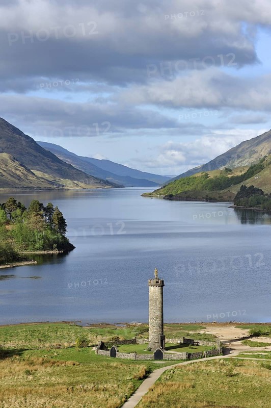 The Glenfinnan Monument on the shores of Loch Shiel, erected in 1815 to mark the place where Prince Charles Edward Stuart, Bonnie Prince Charlie raised his standard, at the beginning of the 1745 Jacobite Rising, Lochaber, Highlands, Scotland, UK