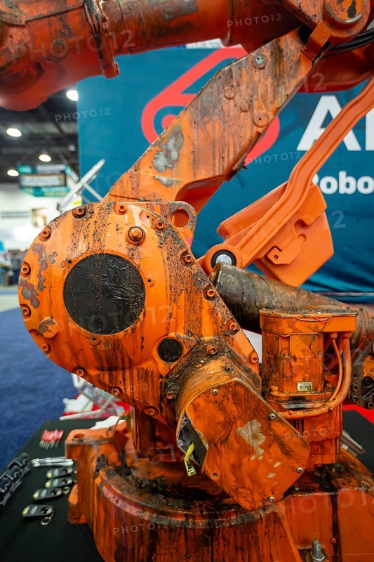 Detroit, Michigan - More than 800 exhibitors displayed at Automate, North America's largest robotic and automation event. A company that reconditions used rebots displays one that needs work