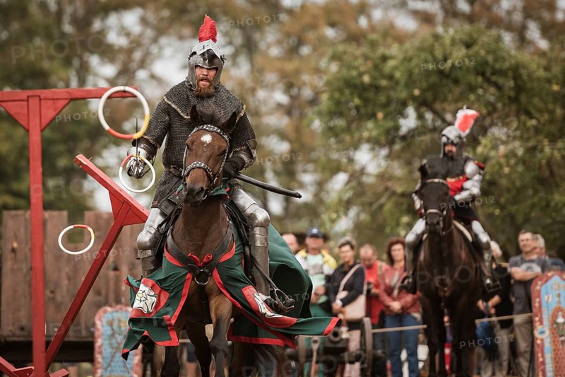 LUBIAZ, POLAND - AUGUST 25, 2018: Monastery Siege - historical staging. Knights horse riding show
