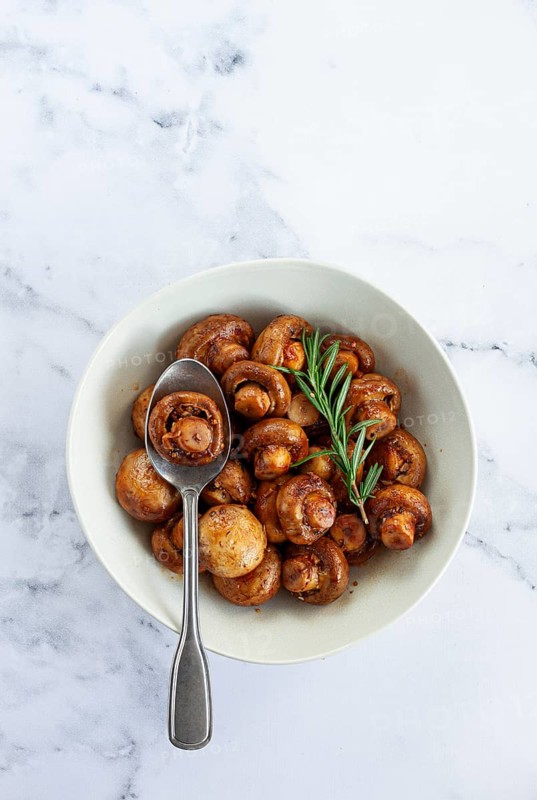 Fried mushrooms, with spices, in soy sauce, vegetarian food, homemade, no people