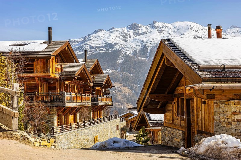 Modern stone and wood holiday homes with snow-covered roofs, Grimentz, Val d'Anniviers, Valais Alps, Canton of Valais, Switzerland