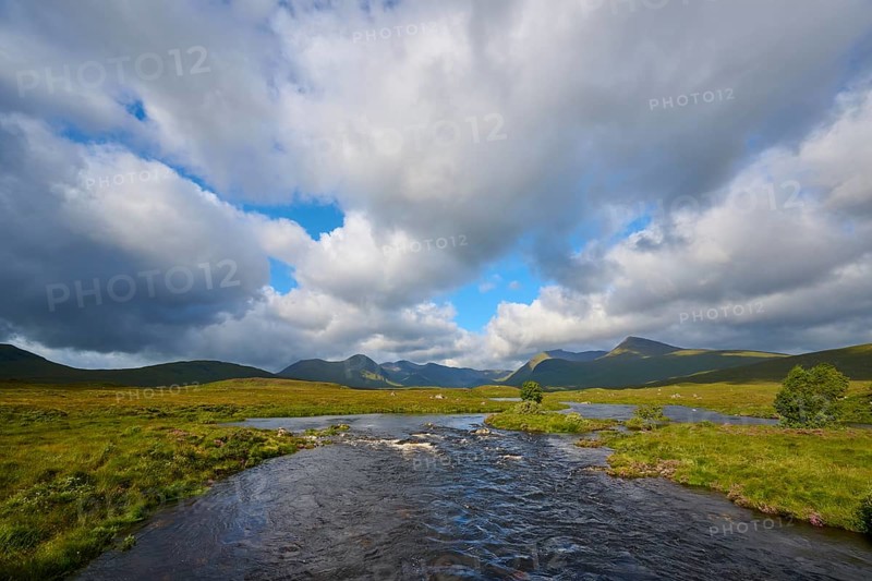 Wide river landscape under dramatic clouds and mountains in the background, Rannoch Moor, Bridge of Orchy, Scotland, United Kingdom, Great Britain