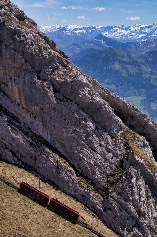 Pilatus railway, steepest cogwheel railway in the world from Alpnach to the Pilatus, behind it Swiss mountain range, Alps, snow-covered, Canton Lucerne, Switzerland
