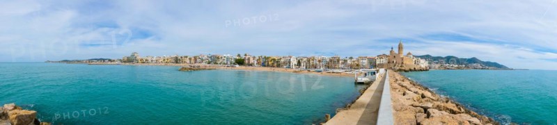 Panoramic view of the beach and promenade in Sitges, Spain
