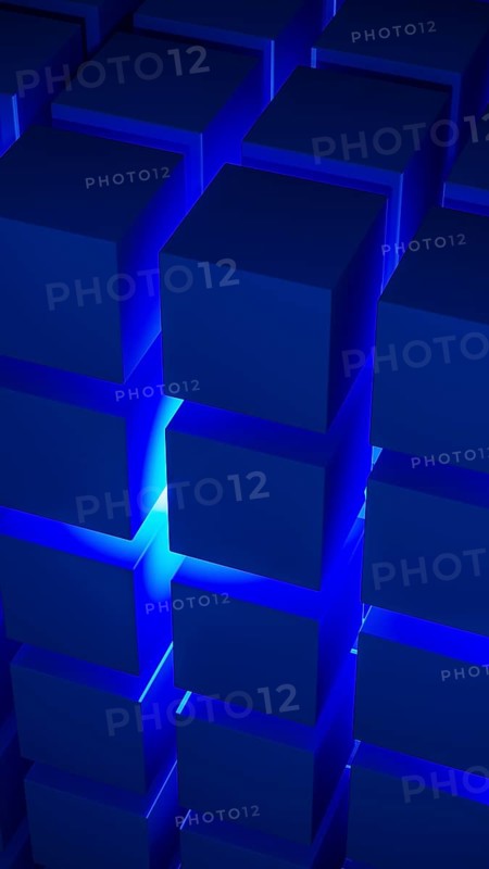 Cube structures create a captivating geometric arrangement highlighted by blue light, showcasing modern design concepts and technological inspiration
