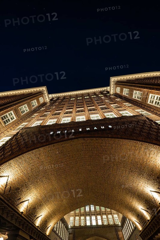 Modern underground station with yellow columns and bright lighting, elongated design, Hamburg, Germany