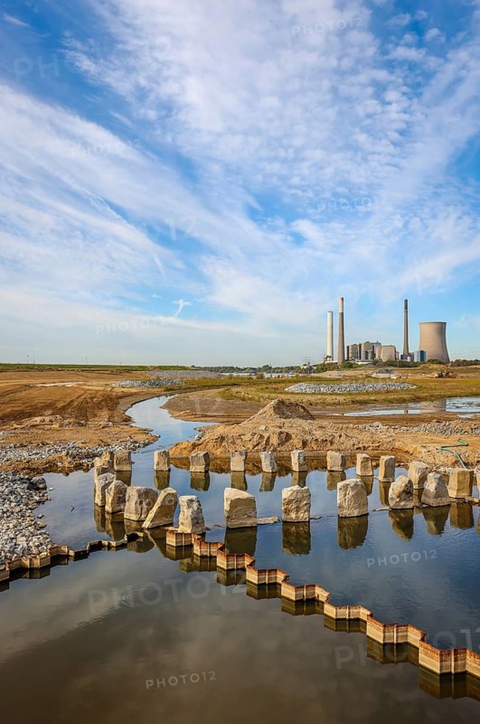 Dinslaken, Voerde, North Rhine-Westphalia, Germany, Emscher estuary into the Rhine. Construction site of the new Emscher estuary in front of the decommissioned STEAG coal-fired power station in Voerde. The mouth of the Emscher into the Rhine is being moved almost 500 metres north from Dinslaken to Voerde. Fish will then be able to swim barrier-free up the new Emscher from the Rhine through a newly created floodplain area. Following the construction of a parallel sewer, the Emscher has been completely free of sewage since January 2022. The river was previously an open, above-ground combined sewer with rainwater and wastewater