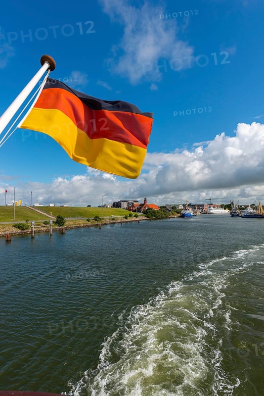 Büsum harbour, North Sea, German flag, fishing cutter, quay, Dithmarschen, Schleswig-Holstein, Germany