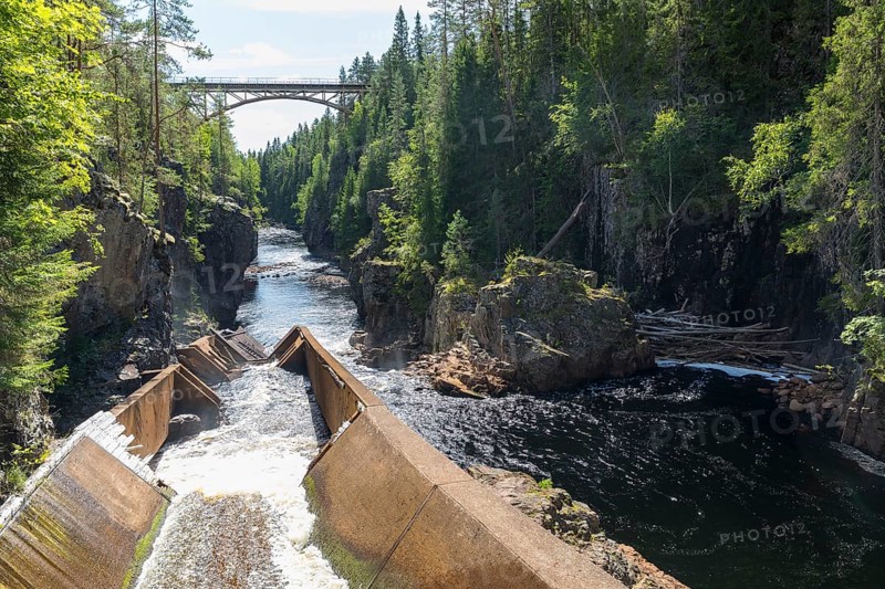 Storstupet, a rapids in the Ämån river near Orsa, a railway bridge in the background, Dalarnas län, Sweden