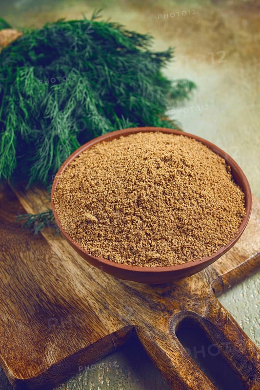 Dried dill, in a ceramic bowl, a bunch of fresh dill, seasoning, top view, no people