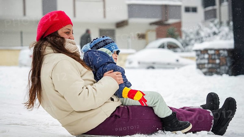 In Gaziantep, Turkey, on December 31, 2025, children and families enjoy winter activities as they play on snow-covered areas and slide on icy hills, creating a lively atmosphere across the city during the final day of the year, Gaziantep, Gaziantep, Turkey