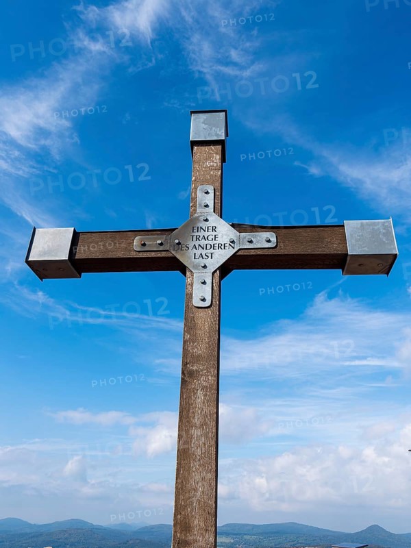 Christian cross with inscription, One bears the other's burden, Hochwald summit, Zittau Mountains, Saxony, Germany