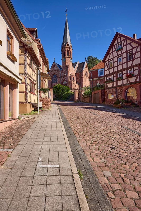 Untere Walldürner Straße with St John's Church and half-timbered house in Miltenberg, Lower Franconia, Miltenberg district, Bavaria, Germany