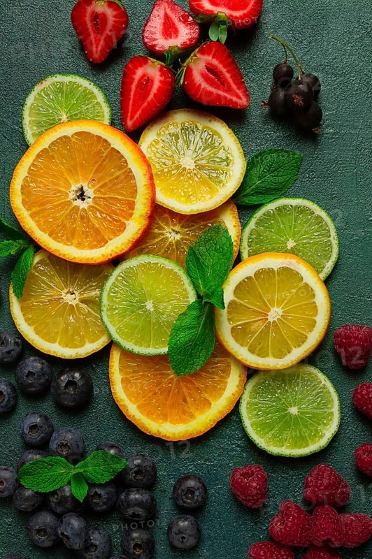Mix of fruits and berries, set, assortment, sliced citrus fruits, raspberries, blueberries, mint leaves, strawberries, red currants, food background, fruit wallpaper