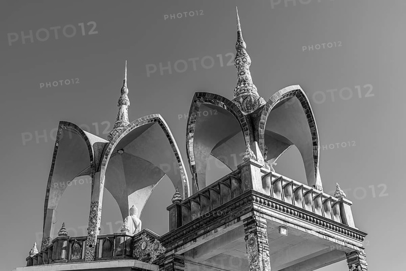 Round arch pavilions decorated with mosaics and glass works of art, black and white photo, Buddhist temple complex Wat Phra That Sorn Kaew, Phetchabun province, Thailand