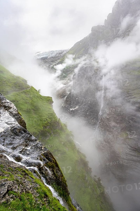 Cloud-covered mystical rock gorge with waterfalls, hike to Berghaus Bäregg, Bernese Alps, Bernese Oberland, Switzerland