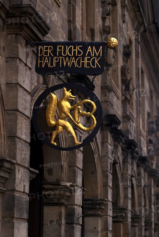 Fox with pretzel, nose sign of the bakery Der Fuchs am Hauptwacheck, café, Bamberg, Upper Franconia, Bavaria, Germany