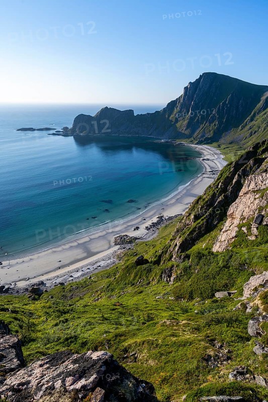View of coastal landscape, cliffs with peak Måtind or Måtinden, Høyvika beach and sea, hike to the peak of Måtind, Andøya island, Vesterålen, Nordland, Norway